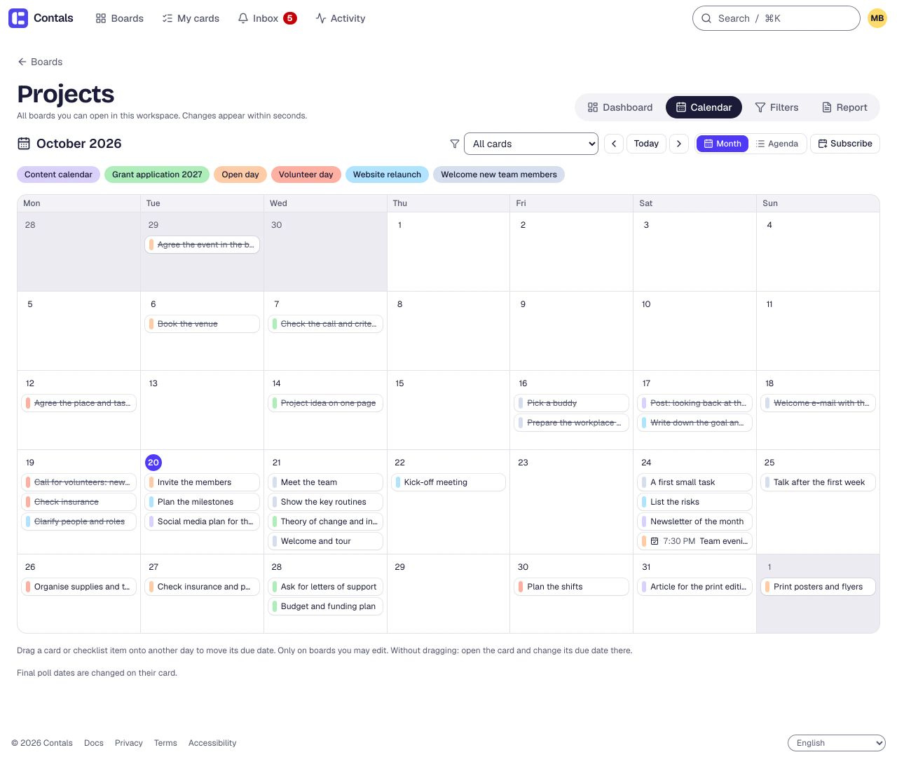 The workspace calendar for one month: the due dates of six project boards, each in its board’s colour, and the evening picked in a date poll.
